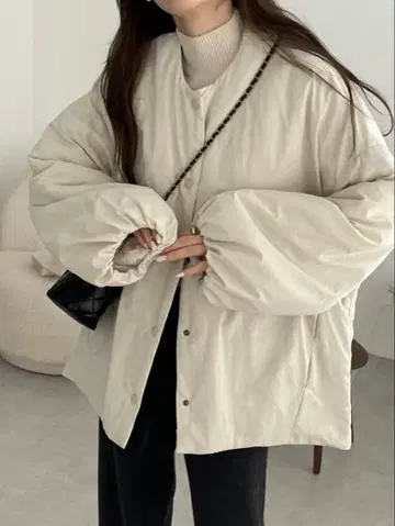 andme 사이드 지퍼 노카라 충전솜 다운 자켓