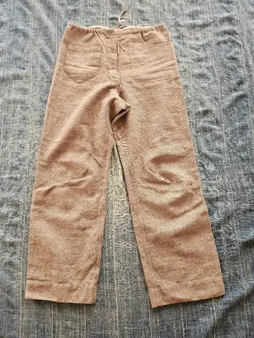 아틀리에 마니스 베이지 캐주얼 팬츠 셰틀랜드 울 사용