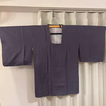 보라색 버튼 달린 도유 코트