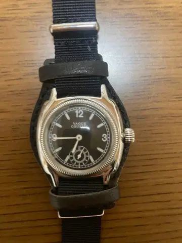 VAGUE WATCH COUSSIN EARLY MIL