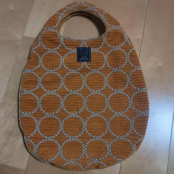 미나 페르호넨 탬버린 오렌지 코듀로이 에그백