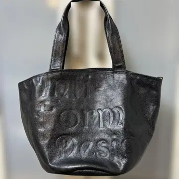 안티름 천연 가죽 블랙 토트백 엠보싱 로고 원형 바닥