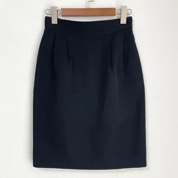 꼼사데모드 무릎 기장 타이트 스커트 블랙 포켓 있음 울 100%