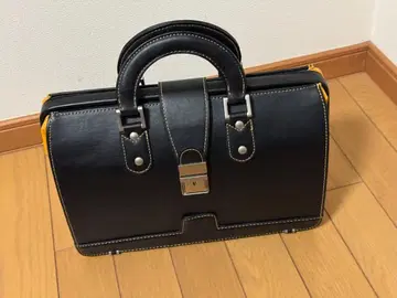 핸들 부착 더레스 백 블랙 오렌지