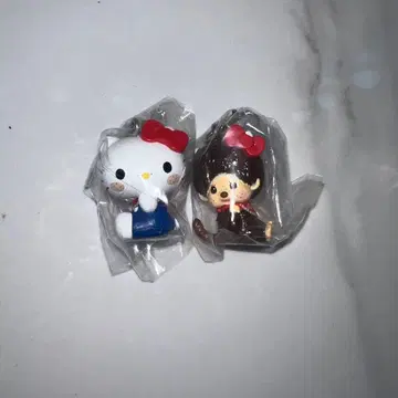 MONCHHICHI x HELLO KITTY 메지루시 액세서리 2개 세트