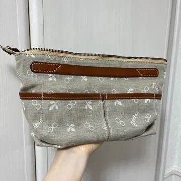 겐텐 크로스펀칭 이너 스페이스 클러치