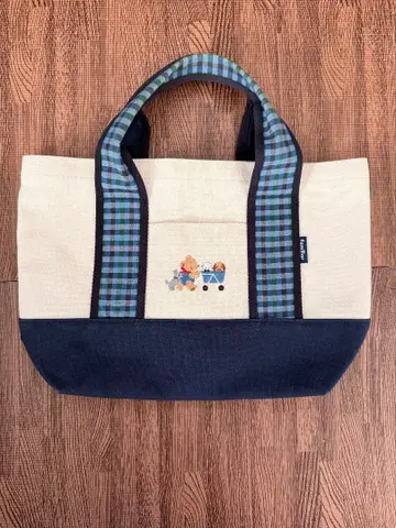 2회 사용 파미리아 히로오 베이지 네이비 토트백 체크 무늬
