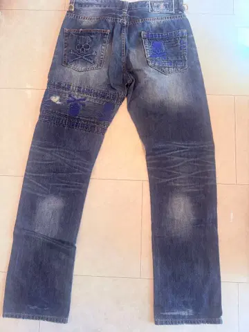 mastermind 스컬 자수 데님 팬츠