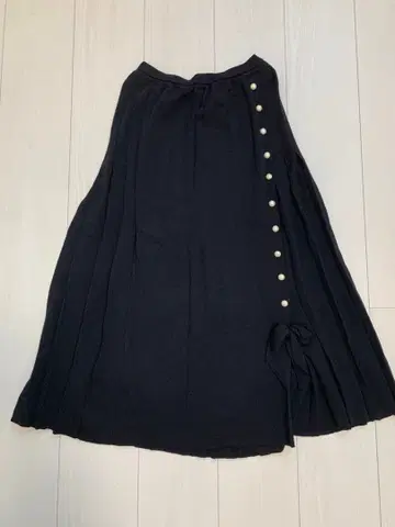 INGEBORG 펄 리본 니트 플리츠 스커트