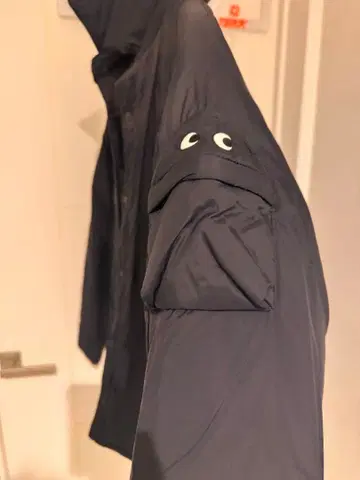 유니클로 x 안야 힌드마치 퍼프 테크 자켓