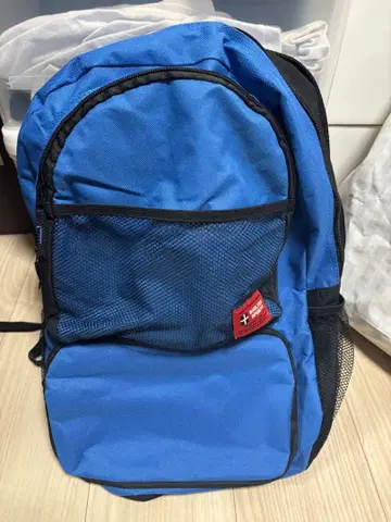 파랑 메쉬 포켓 백팩