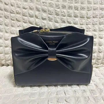 사만다 타바사 드레이프 리본 가죽 숄더백 블랙