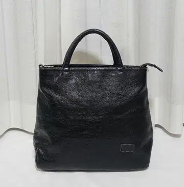 누이 사에몬 블랙 천연 가죽 토트백