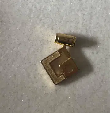 코란토테 목걸이 탑