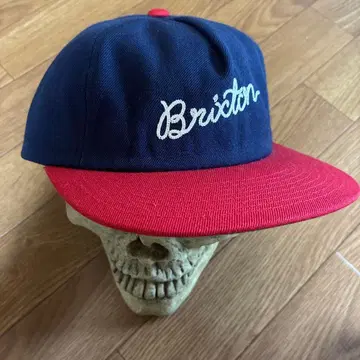 Brixton 네이비/레드 캡