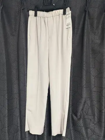 UNFILO 아이보리 슬릿 팬츠