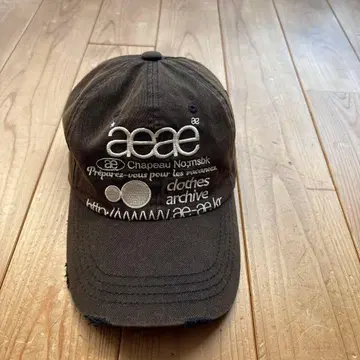 aeae 브라운 캡 로고