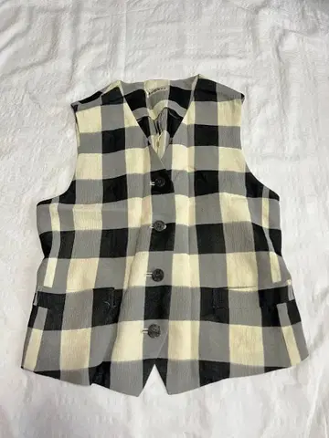 체크 무늬 슬리브리스 베스트