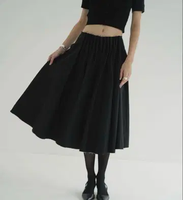CLANE TUCK DETAIL FLARE SKIRT