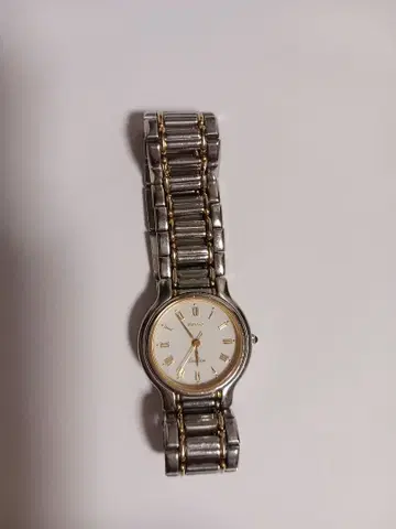 SEIKO의 실버와 골드 스테인리스 쿼츠 손목시계 (배터리 교체 완료)