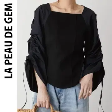 LA PEAU DE GEM 오픈 숄더 블라우스
