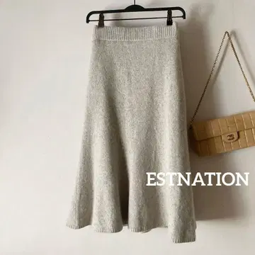 에스트네이션 기모감 캐시미어 울 종아리 기장 플레어 니트 스커트
