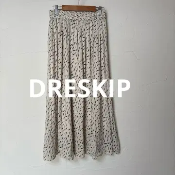 새상품급 DRESKIP 올 패턴 플레어 스커트/베이지