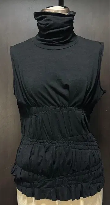 장 폴 고티에 하이넥 스티치 슬리브리스