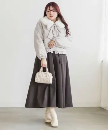 퍼 리본 포함 퀼트 자켓