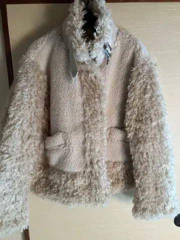 언그리드 보아 무스탕 블루종