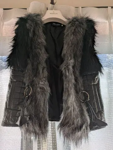 퍼가 달린 퀼팅 베스트