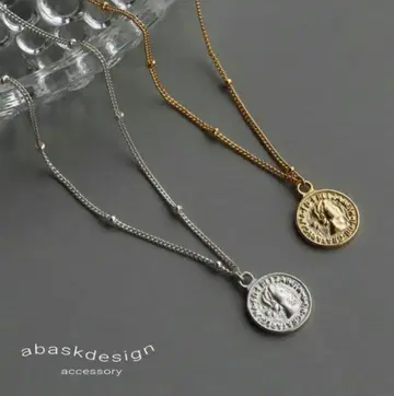 아바스크 디자인 코인 목걸이 실버 ete AHKAH nojess