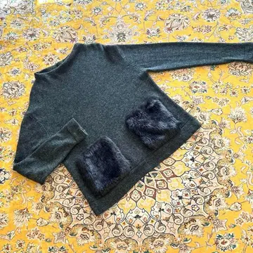 에스트네이션 퍼 보아 포켓 부착 니트