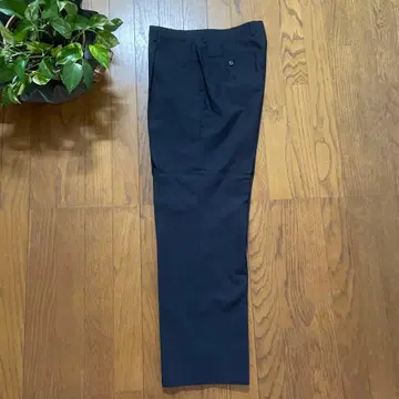 남성용 슬랙스 백 포켓 부착