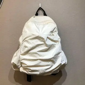 emmi eco 발수 가죽 파이핑 개더 바디 백팩