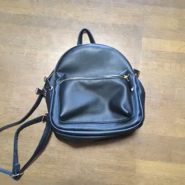 블랙 백팩 지퍼 포켓 부착