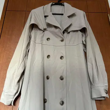 베이지 더블 브레스트 슬리브리스 코트