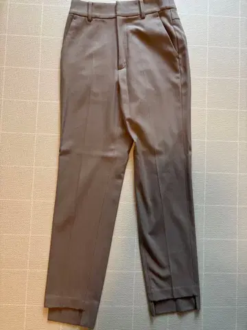 Noble 캐럿 실루엣 헴 스텝 팬츠 34