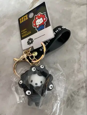 오사카 만박 블랙 미야쿠미야쿠 산리오 키링 포차코