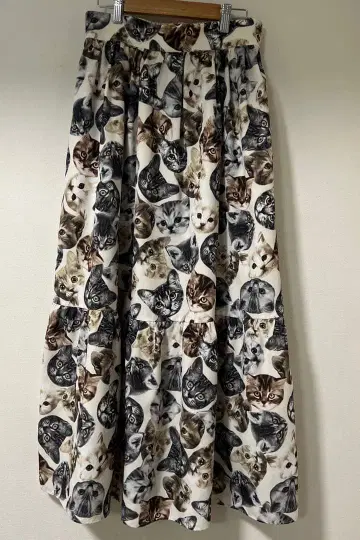 앤드 엘씨 고양이 스커트 베이지