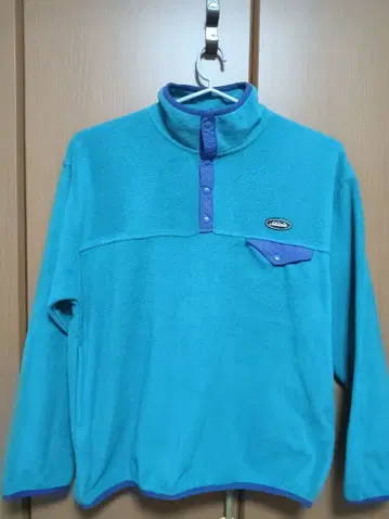 스핀스 하프 스냅 버튼 플리스 자켓 블루종