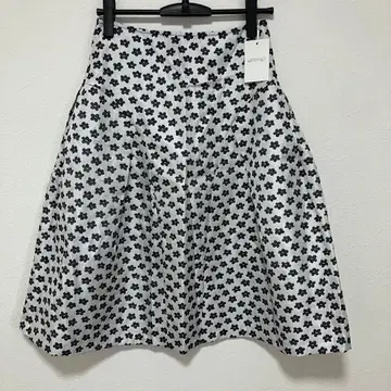 MEEKAT 미캣 플라워 자카드 플레어 스커트