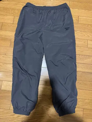 Reebok 와셔 나일론 사이드 지퍼 팬츠 그레이