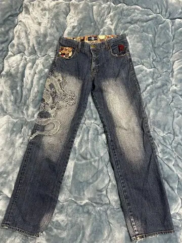 용 자수 데님 팬츠