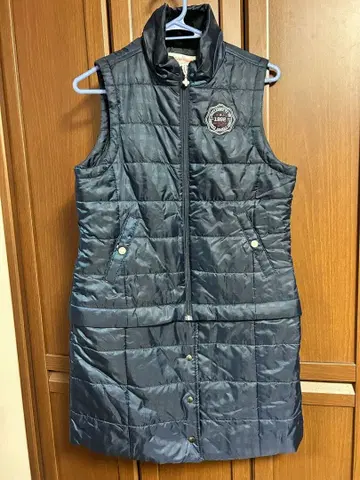 네이비 퀼팅 슬리브리스 베스트