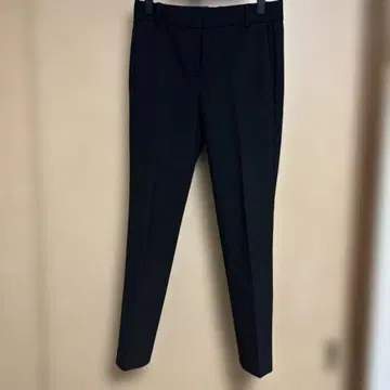 띠어리 블랙 슬랙스 백 포켓 부착