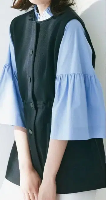 UNFILO 형태 니트 베스트