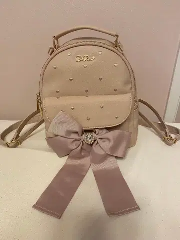 룰루아 베이지 리본 포함 백팩