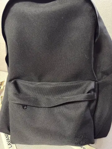블랙 백팩 프론트 포켓 부착