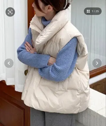 아이보리 다운 베스트 지퍼 포함